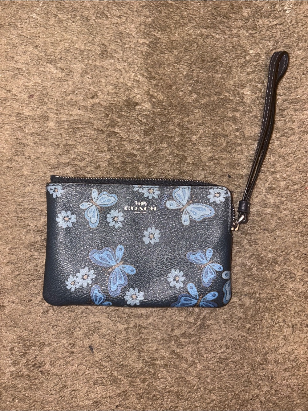 Coach Navy Wristlet with Light Blue Butterfly Print